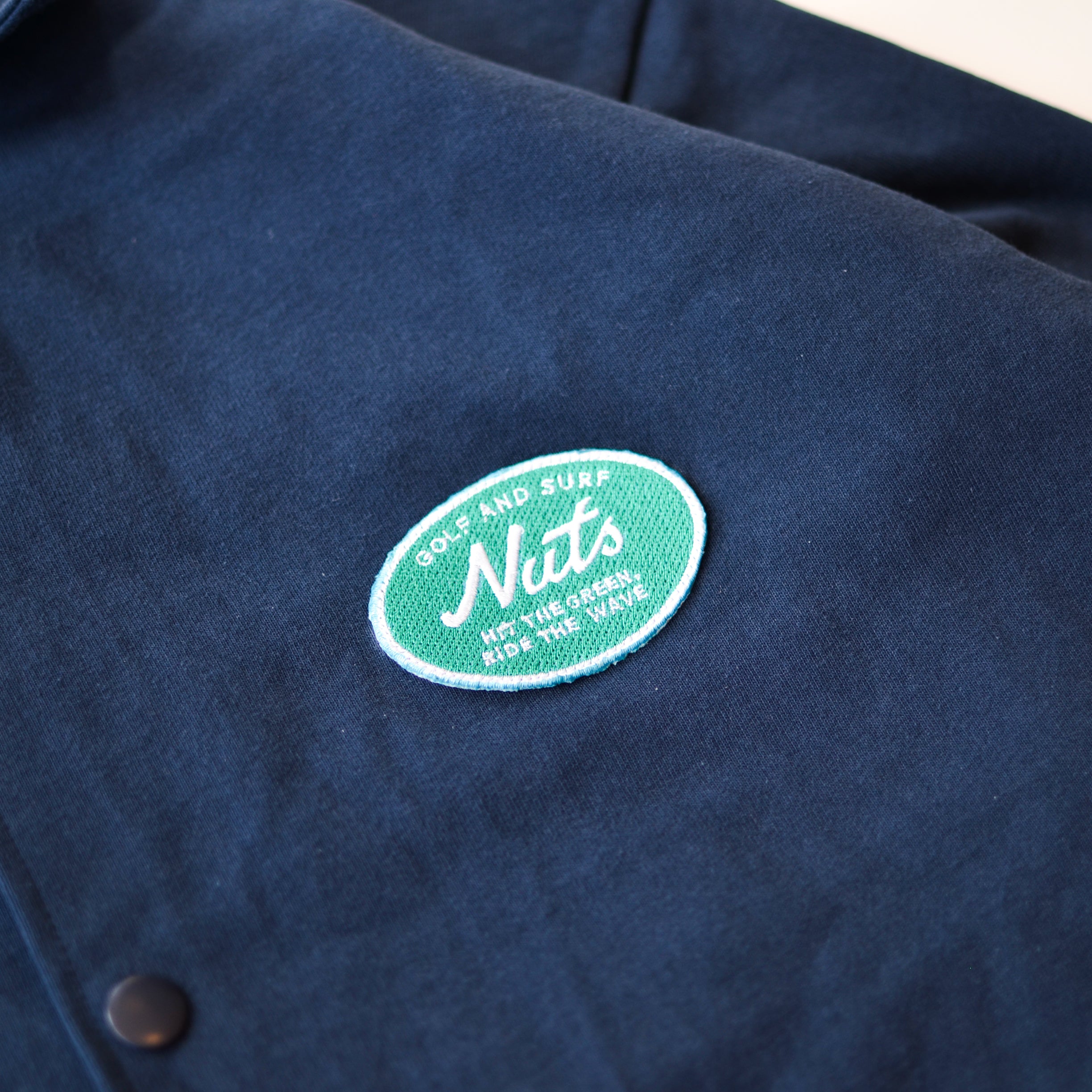 NUTS × FIG "ORIGINAL COTTON COACH JACKET"
